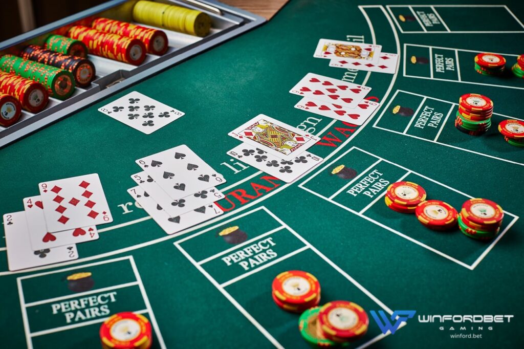 a blackjack table with different kinds of hands' combination and their bets